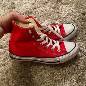Red Converse high top Chuck Taylor’s